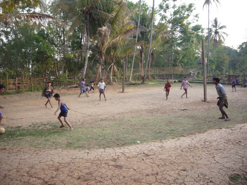 Footie on the volleyball pitch behind the monastery